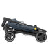 Folded stroller with Maxi-Cosi branding on a white background.
