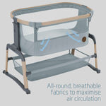 Portable crib with text about breathable fabrics and air circulation on a gray background