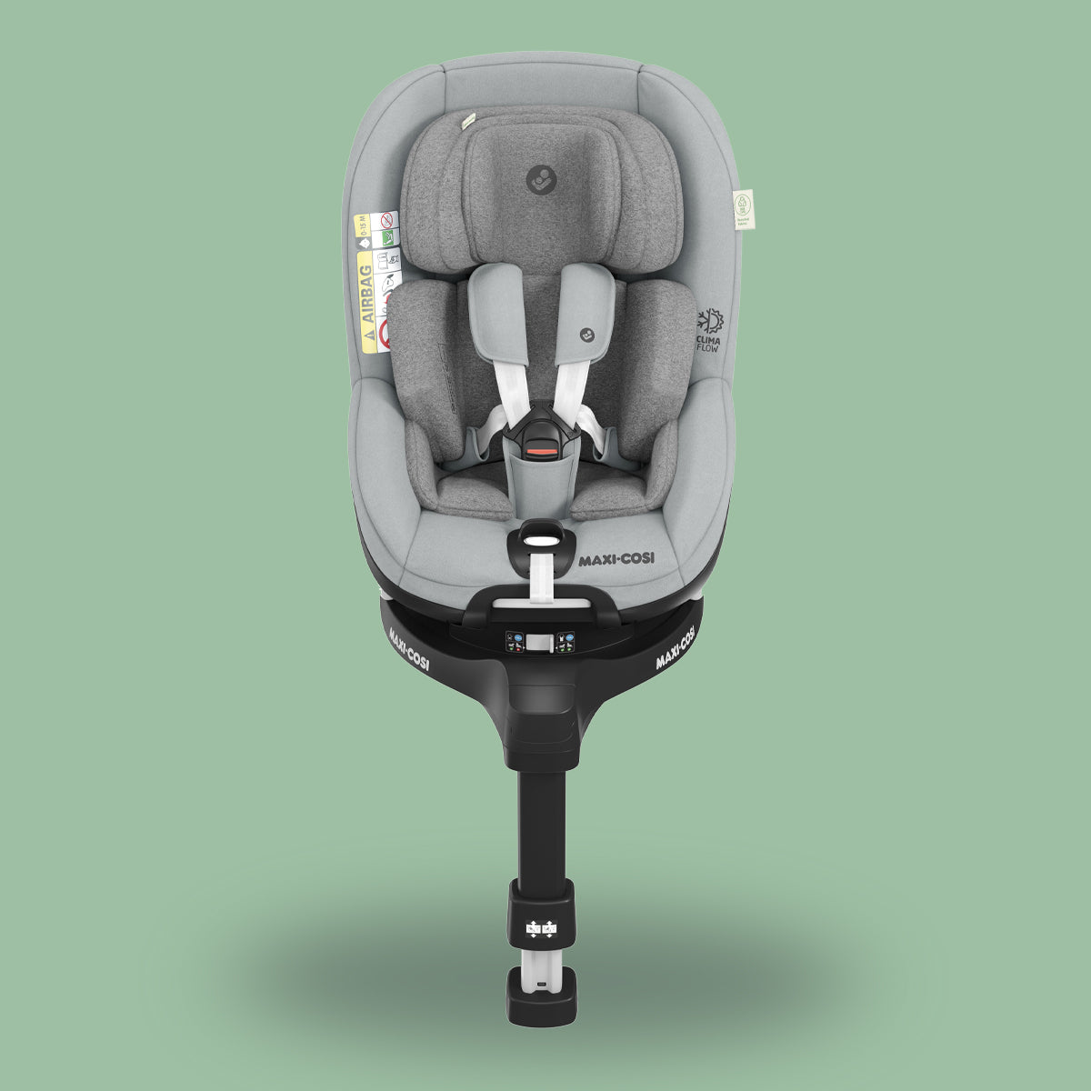 A Maxi-Cosi Mica Pro Eco i-Size baby car seat with a green background.