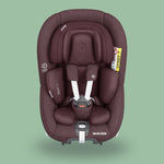 A Maxi-Cosi Pearl 360 rotating car seat in burgundy.