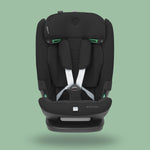 A black Maxi-Cosi Titan Pro i-Size car seat for children, displayed against a green background.