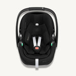 Front view of a black Maxi-Cosi Pebble 360 Pro² baby car seat with white harness straps on a light cream background.